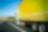 Yellow truck on the road