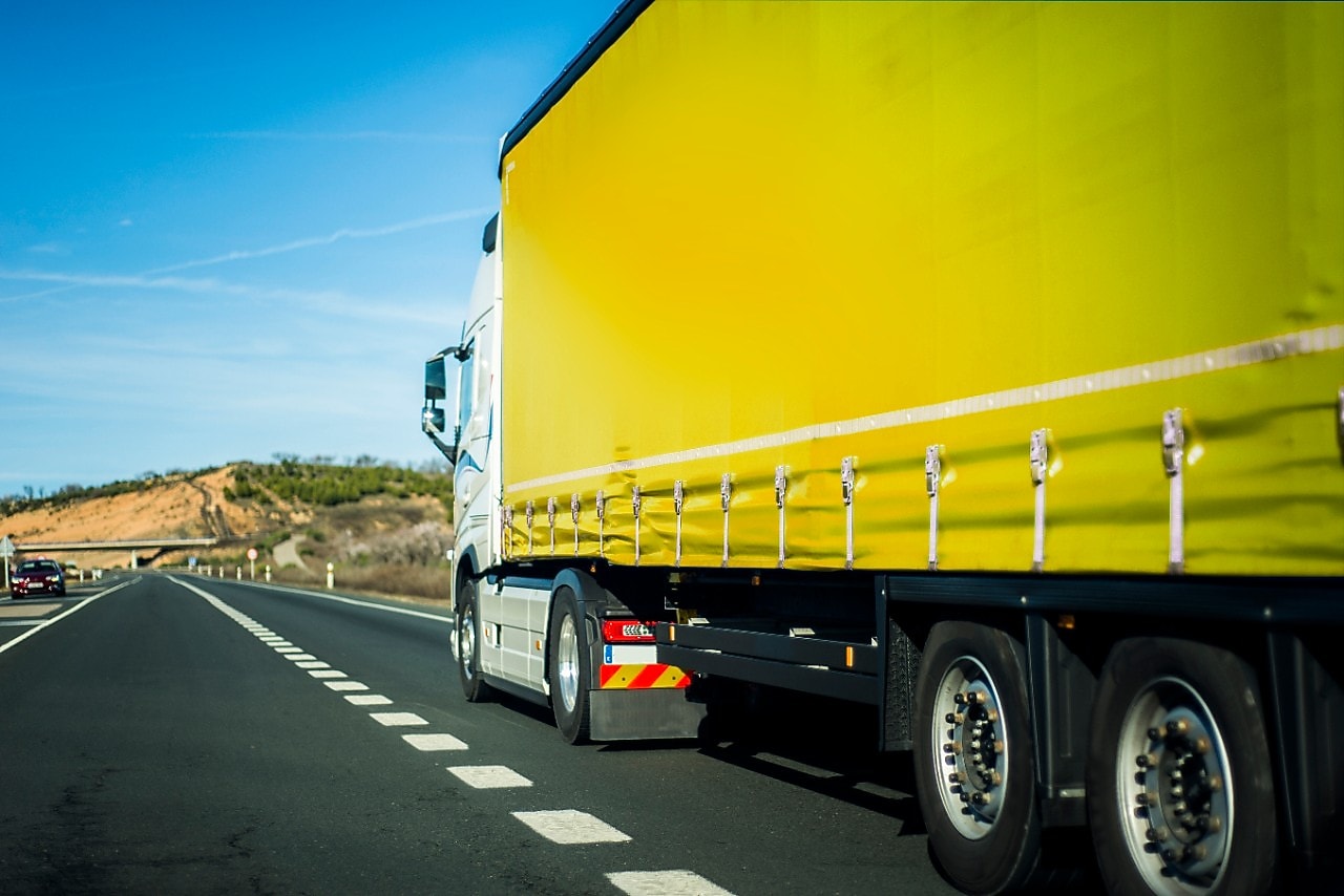 Yellow truck on the road