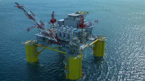 Digital visualisation of the Sparta offshore oil and gas platform showing a large floating structure at sea supported by four yellow columns, with cranes, processing equipment, and a helipad on the top deck, surrounded by open water.