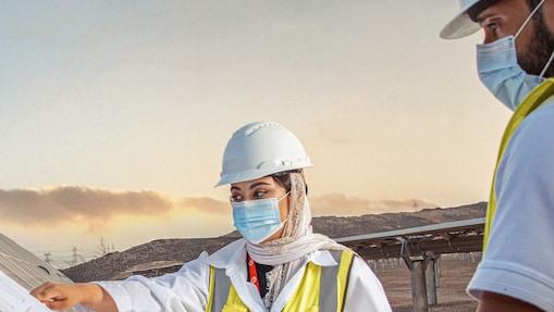 Two employees working on a project