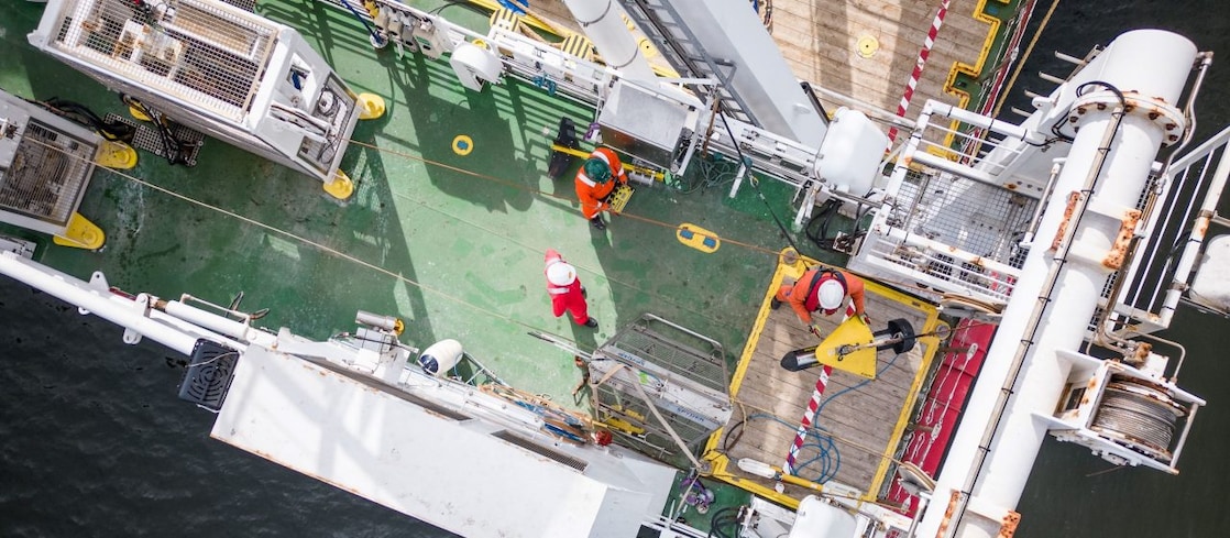 Back deck of the Fugro Galaxy survey vessel with sensor preparations underway.
