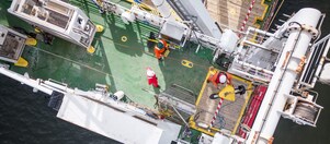Back deck of the Fugro Galaxy survey vessel with sensor preparations underway.