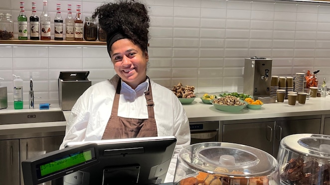 Najla Curiel, who lost her hearing when she was one, at work at Shell’s sign language café in The Hague