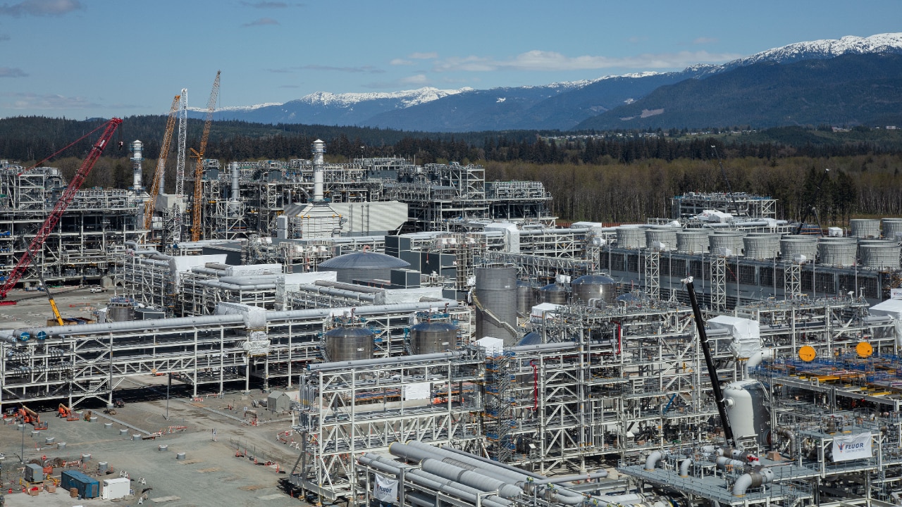 Cooling towers at the LNG Canada site in May 2023 (seen in the middle on the right).