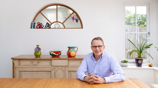 Sir Andrew Mackenzie in the kitchen of his home in London.