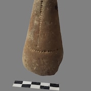 A loom weight, one of the artefacts found during the excavation.