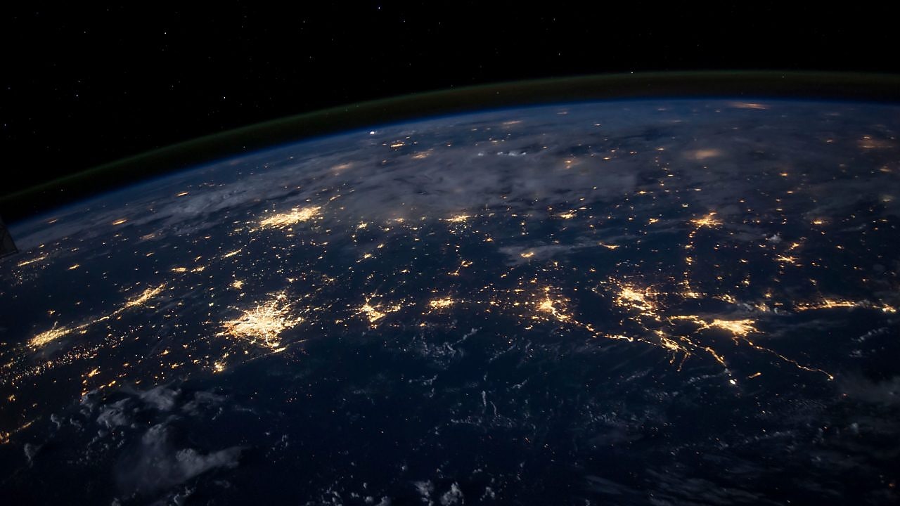 Aerial view of the earth showing city lights City lights of the Southern United States.