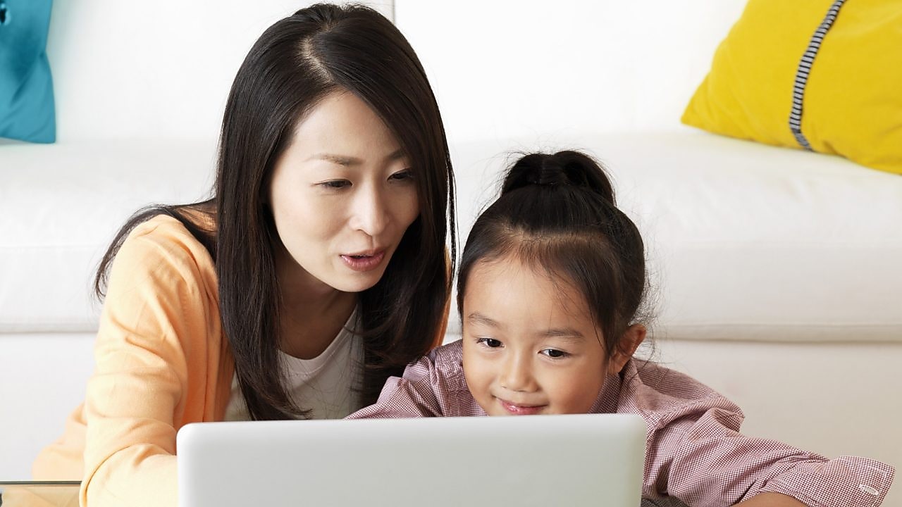 Mother and daughter on a laptop