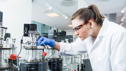 Scientist in laboratory testing biomethane