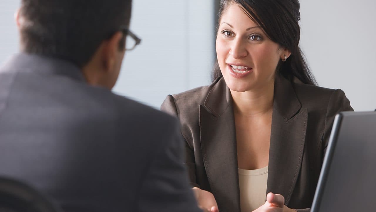 Four people in a meeting
