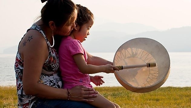 Engaging with Nivkh community members at the traditional Fishermen Day festival on Sakhalin Island