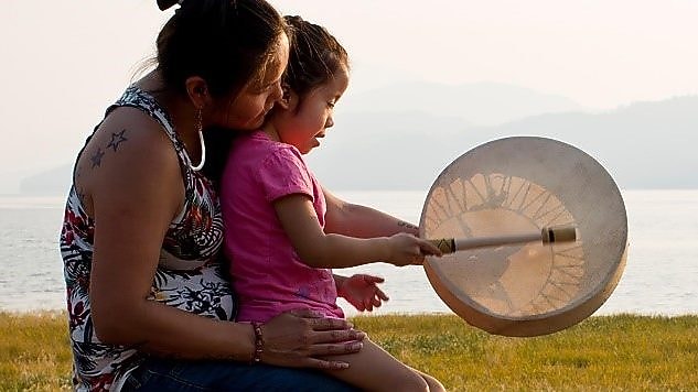 Engaging with Nivkh community members at the traditional Fishermen Day festival on Sakhalin Island