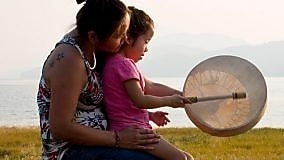 Engaging with Nivkh community members at the traditional Fishermen Day festival on Sakhalin Island