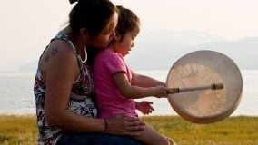 Engaging with Nivkh community members at the traditional Fishermen Day festival on Sakhalin Island