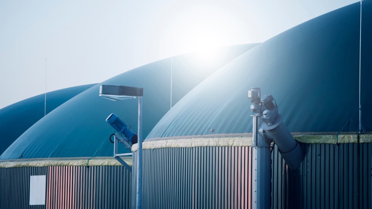 High-tech biogas plant with polished metal surfaces and industrial equipment
