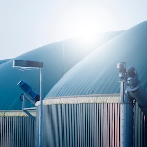 High-tech biogas plant with polished metal surfaces and industrial equipment