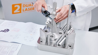 Engineer inspecting 3d print