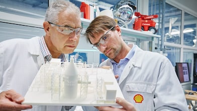 Engineer inspecting industrial 3d printing