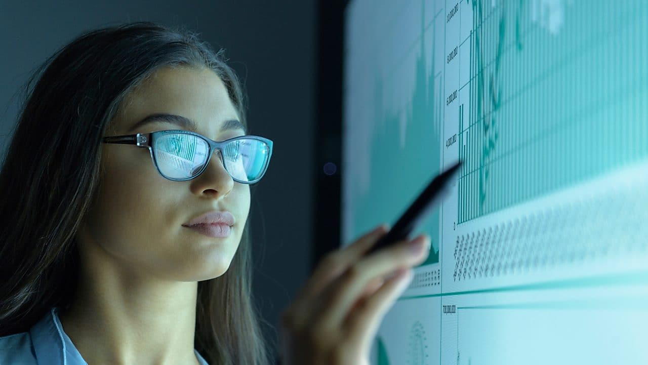 Data scientist reviewing data