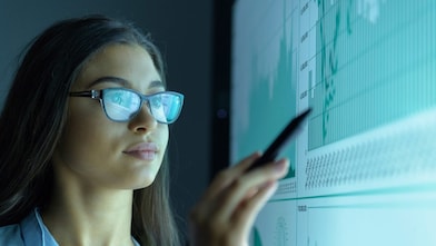 Data scientist reviewing data