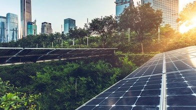 Roof top solar installation with shenzhen downtown skyline view as background,China.