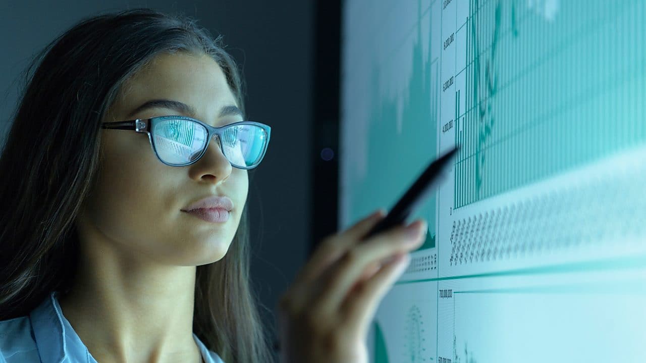 Data scientist reviewing data