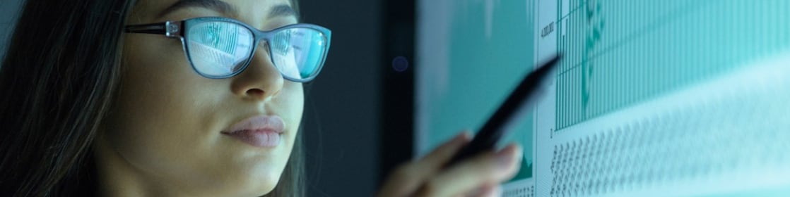 Data scientist reviewing data