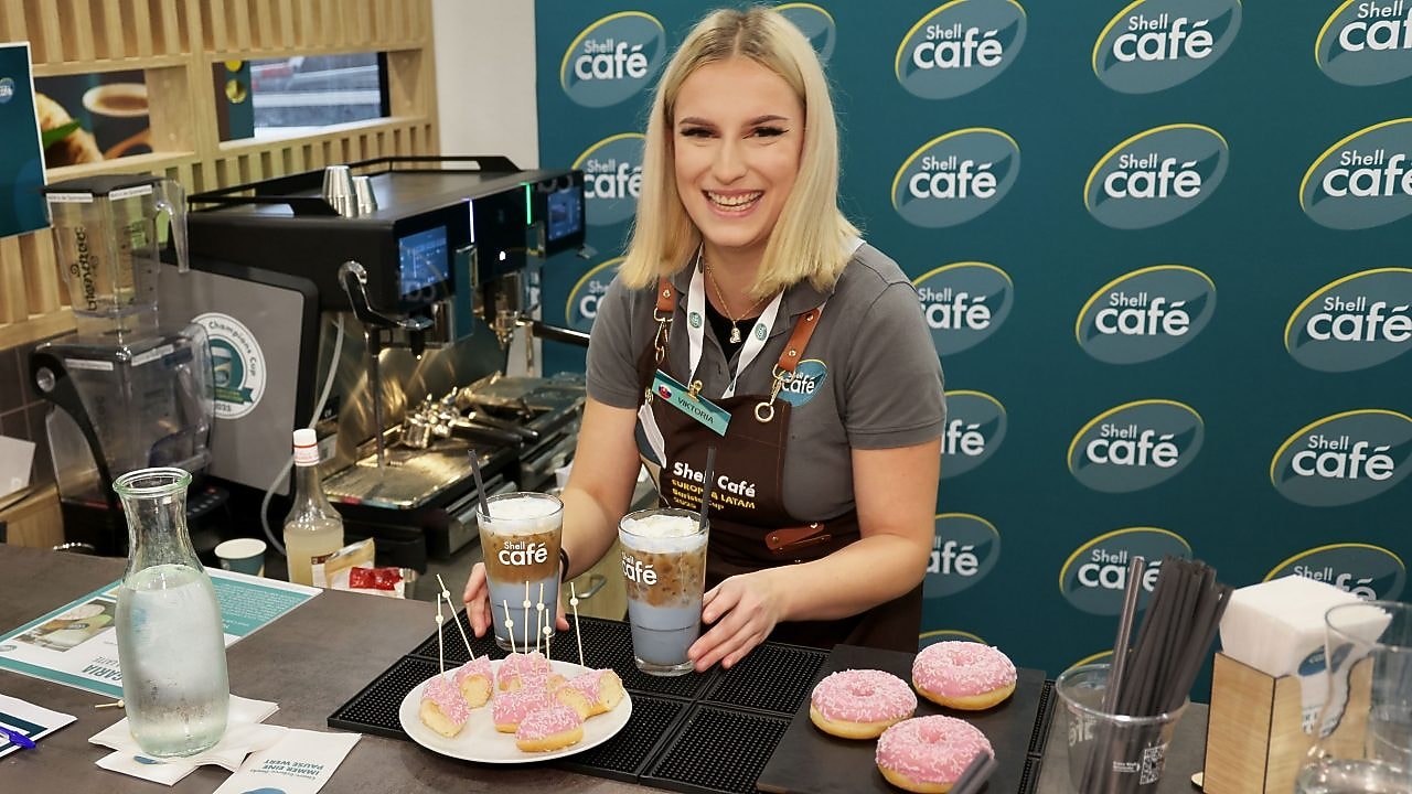 Shell Café Barista Cup 1st place winner Viktória Macaláková serving signature drink