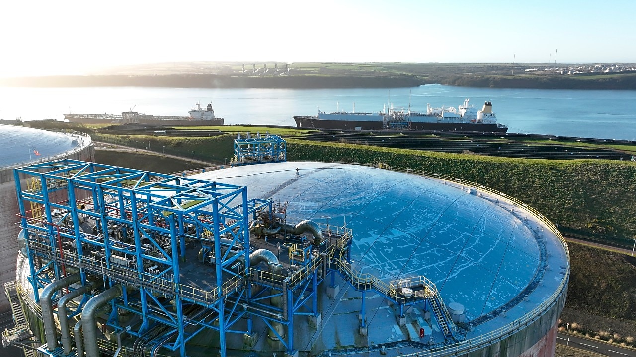Picture of the LNG plant in Wales with the Shell LNG ship in the background