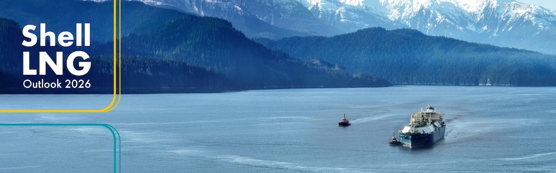 lng tanker in a body of water at the base of mountains