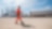 A man walking next to a wind turbine construction site