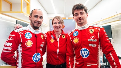 Lewis Hamilton, Valeria Loreti and Charles Leclerc in the Shell Track Laboratory