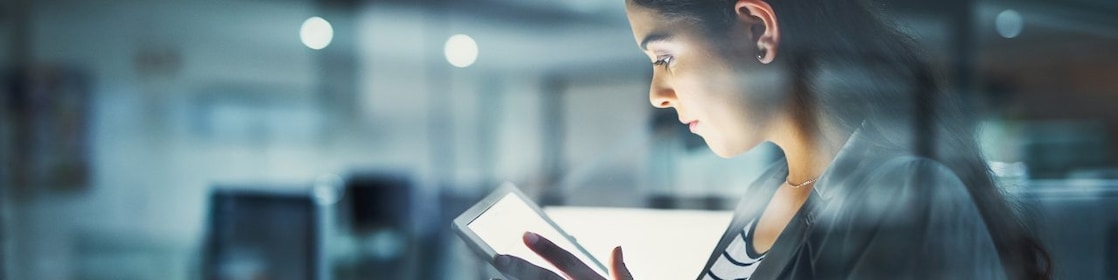 Woman using tab for work