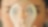 Woman holding a light bulb in front of her face