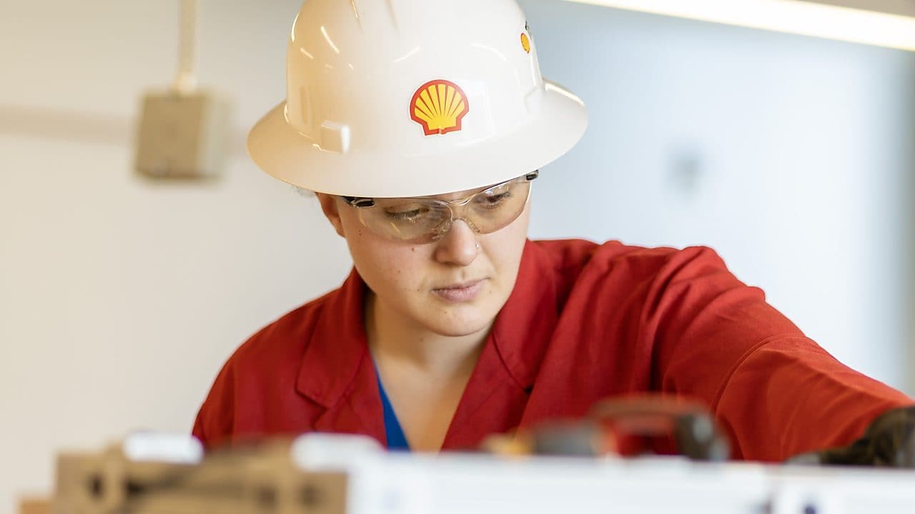Shell worker working on a project.