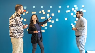 Shell techworkers discussing on topic.