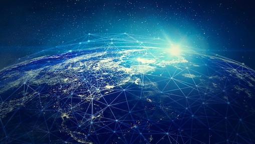 Digital illustration of the world from space with glowing network lines connecting locations worldwide, representing global connectivity.