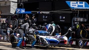 BMW IMSA race car at a pit stop at the IMSA Laguna Sec 2025