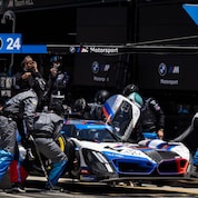 BMW IMSA race car at a pit stop at the IMSA Laguna Sec 2025