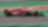 Side view of the F22 Ferrari Formula 1 car being driven by Carlos Sainz round a corner