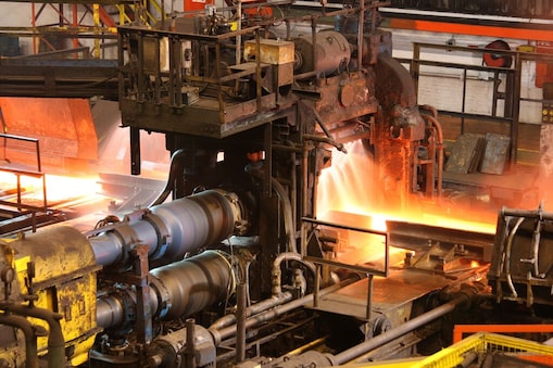 On the image we can see the production of steel, with specialised machinery.