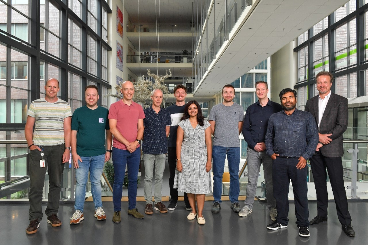 A group of people standing at the ETCA atrium
