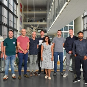 A group of people standing at the ETCA atrium