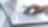 silver laptop with hands typing on it