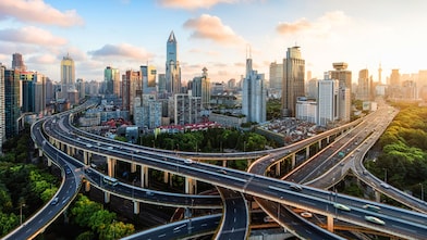 city skyline sunset highways