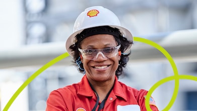 Woman in Shell Safety Helmet Smiling