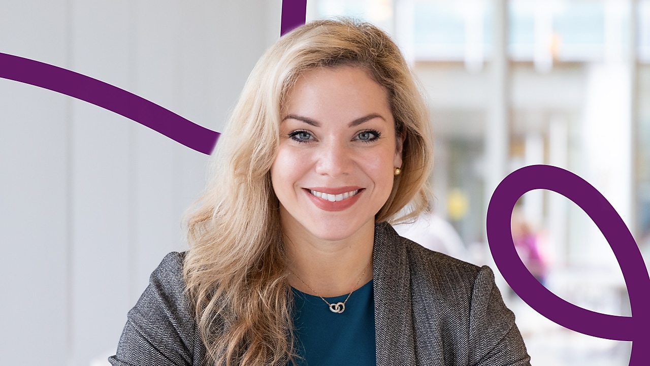 Girl in gray suit smiling