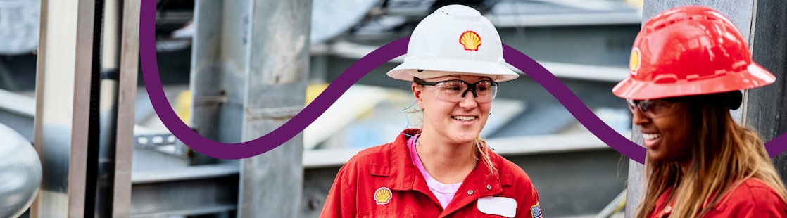 Workers discussing and smiling