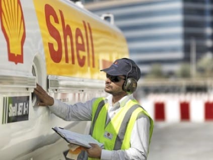 Man inspecting Shell vehicle