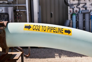 Large pipe with CO2 pipeline sign